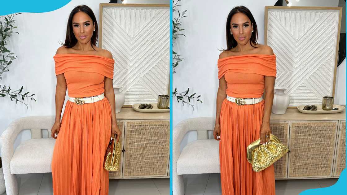 An off-the-shoulder gown with a crystal belt detail