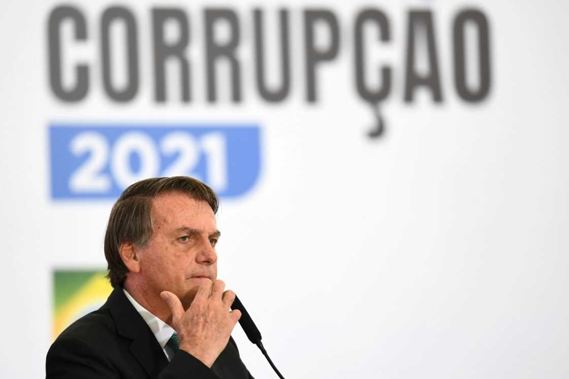 Bolsonaro -- seen here in December 2021 -- was elected on an anti-corruption platform at a time when the country was reeling from a massive graft scandal Bolsonaro -- seen here in December 2021 -- was elected on an anti-corruption platform at a time when the country was reeling from a massive graft scandal