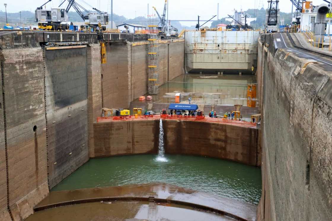 Maintenance work intended to extend the life of the Panama Canal by a century is carried out in a drained lock near the Pacific Ocean, on May 12, 2023 Maintenance work intended to extend the life of the Panama Canal by a century is carried out in a drained lock near the Pacific Ocean, on May 12, 2023