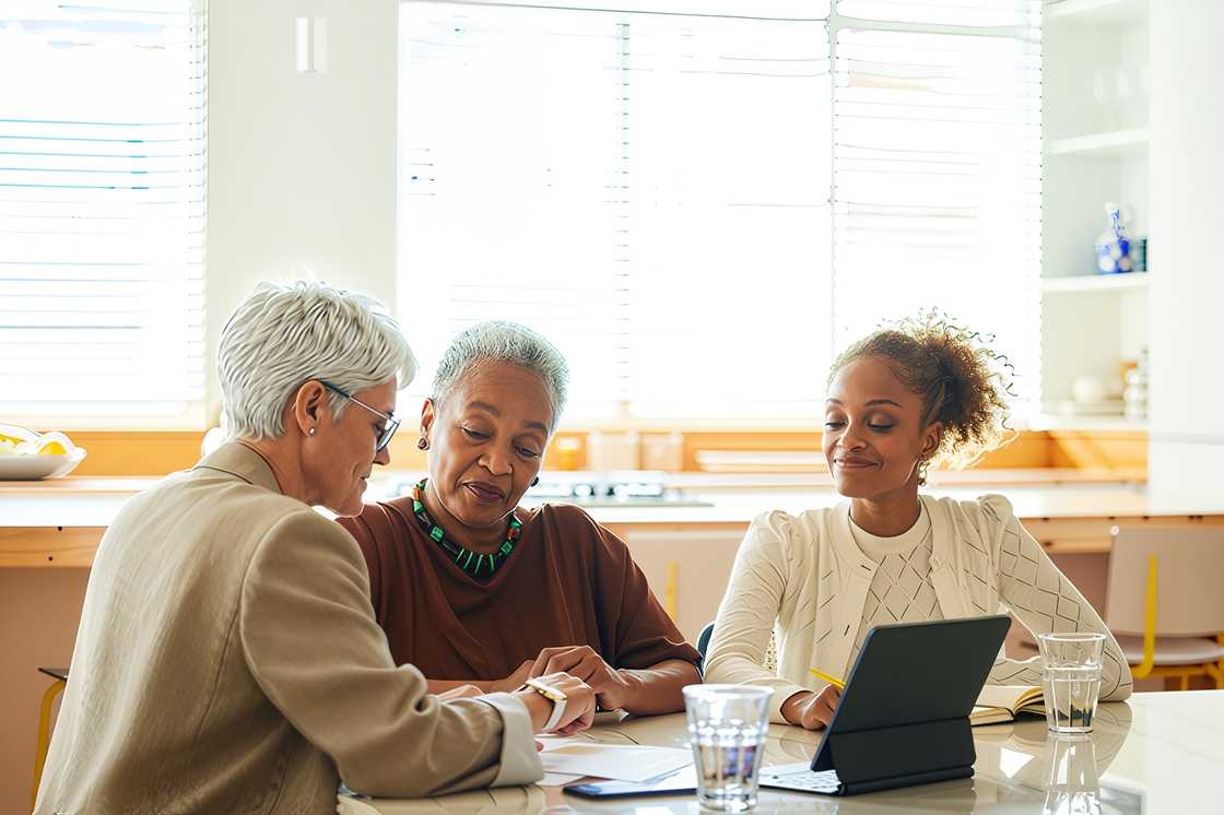 Wealth manager discussing with customers Wealth manager discussing with customers