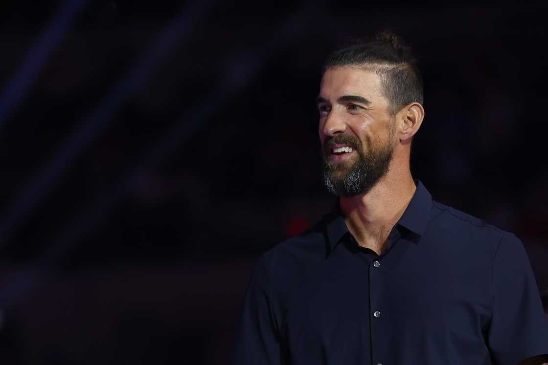 Michael Phelps looks on during Day Seven of the US Olympic Team Swimming Trials at Lucas Oil Stadium in Indianapolis, Indiana