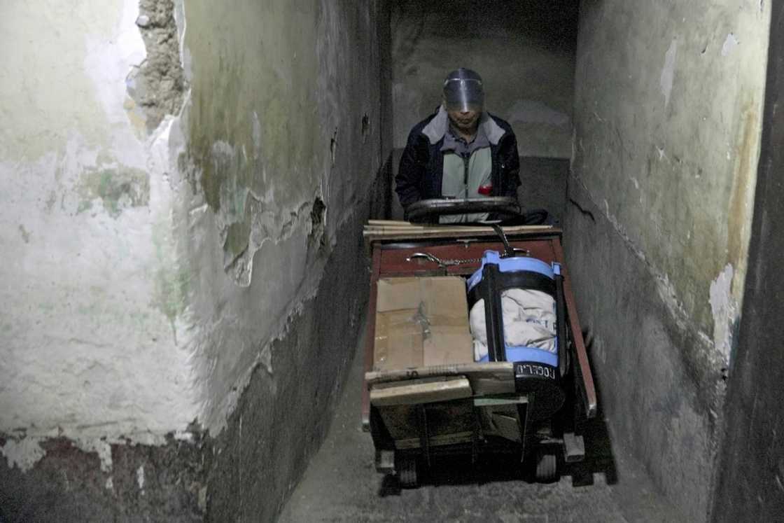 Rogelio Condori and other typists push their small desks to work on the La Paz, Bolivia pavements daily