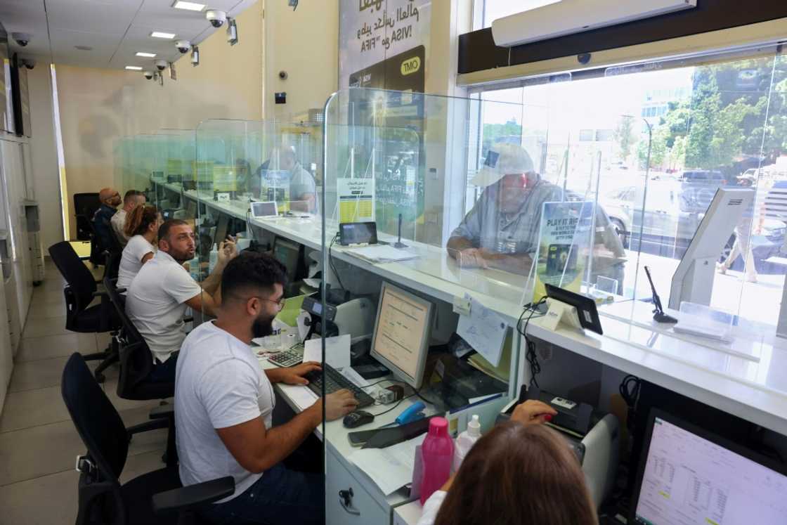 Money transfer agencies are filling the gap after Lebanon's banking sector has largely crumbled Money transfer agencies are filling the gap after Lebanon's banking sector has largely crumbled