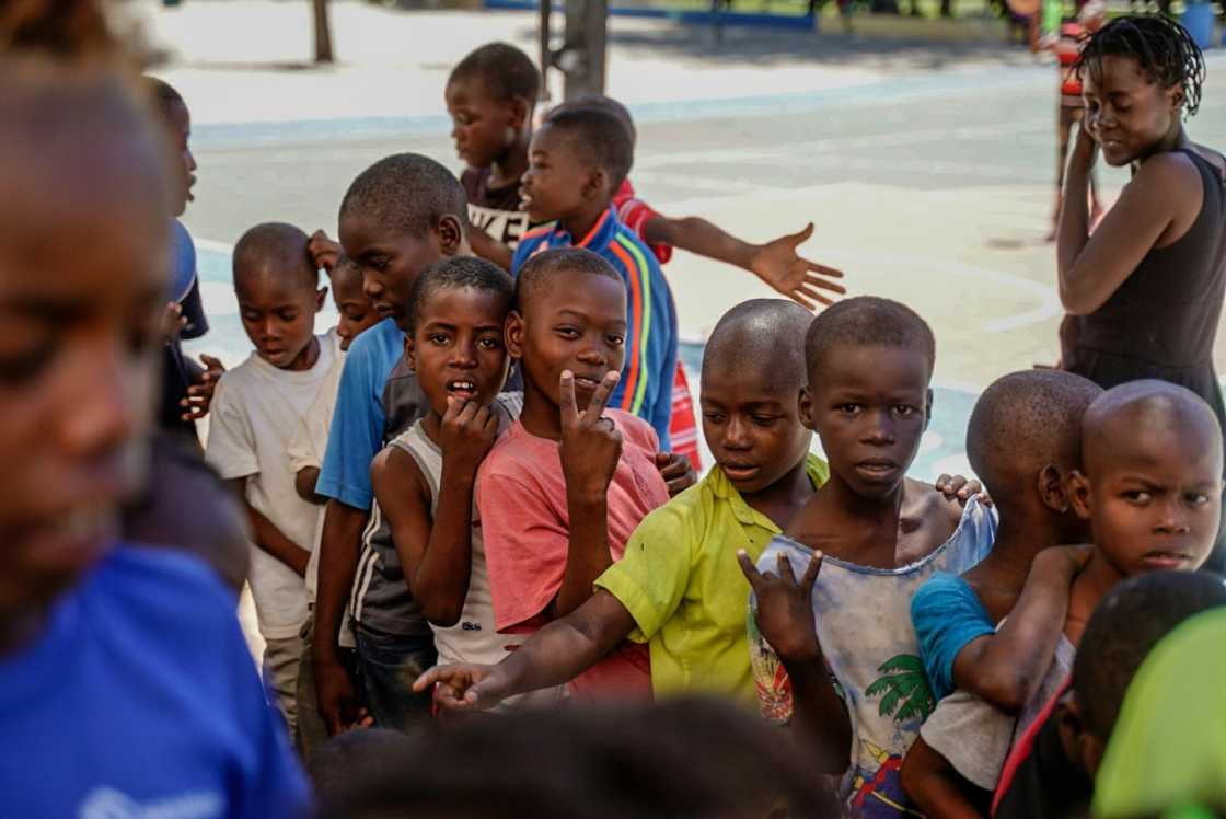 Many of the children's homes in a poor area of the Haitian capital Port-au-Prince were burned by gangs fighting a deadly turf war