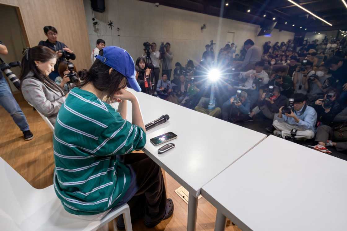 Min Hee-jin, famed superproducer and chief of ADOR, a powerhouse subsidiary of HYBE, attends a news conference denying breach of trust accusations Min Hee-jin, famed superproducer and chief of ADOR, a powerhouse subsidiary of HYBE, attends a news conference denying breach of trust accusations