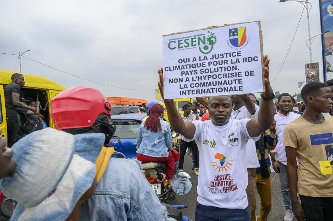 A protestor in Kinshasa accuses the world of climate 'hypocrisy' A protestor in Kinshasa accuses the world of climate 'hypocrisy'