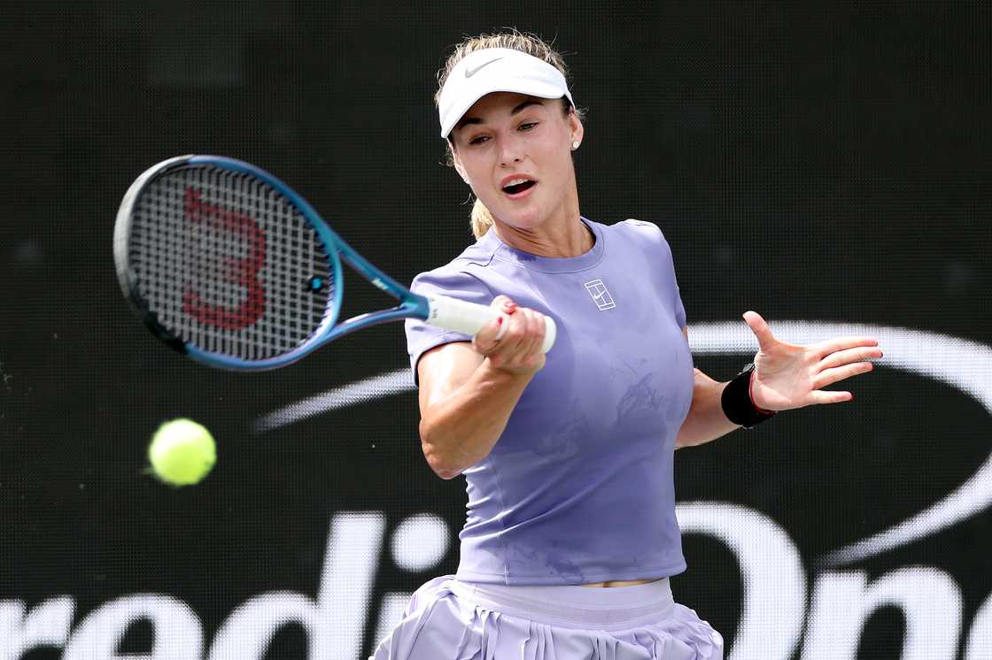 Anna Kalinskaya returns a shot to Caty McNally of the United States during the Credit One Charleston Open Anna Kalinskaya returns a shot to Caty McNally of the United States during the Credit One Charleston Open