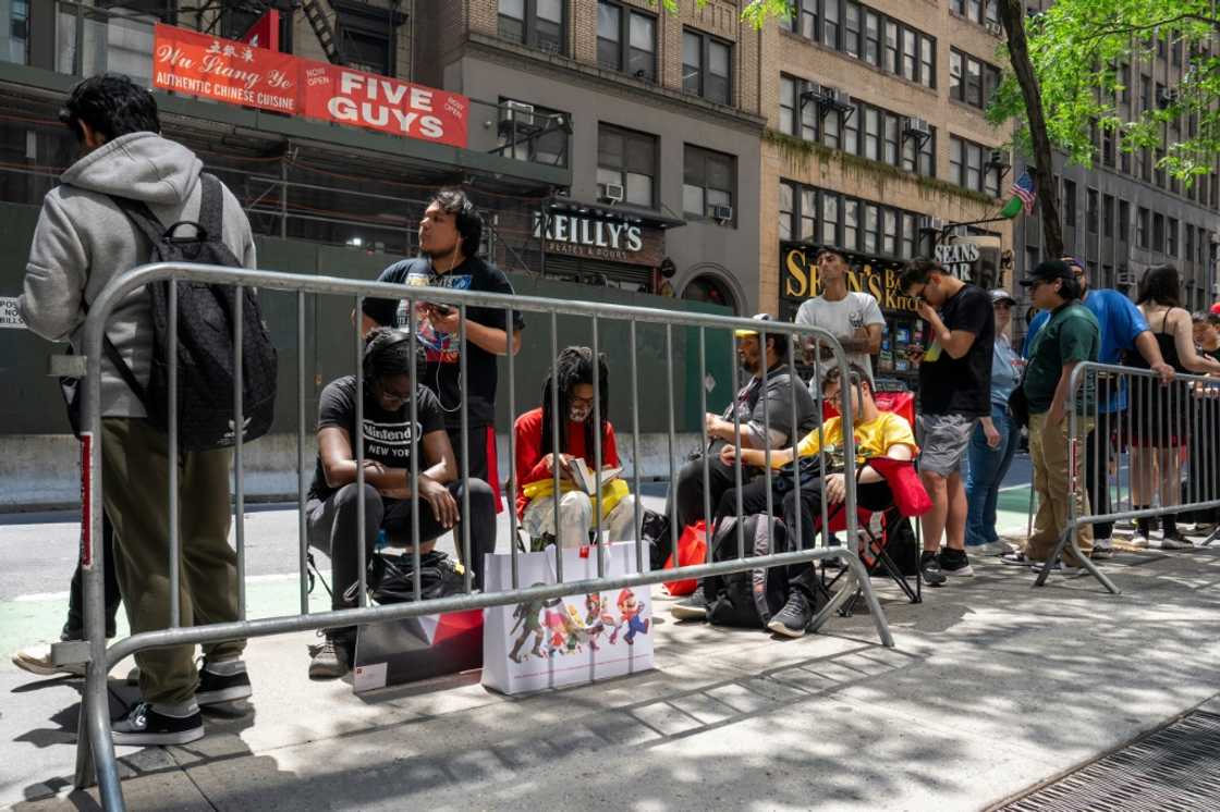 77633217People wait in line at the Nintendo New York store ahead of the release of the Nintendo Switch 25 77633217People wait in line at the Nintendo New York store ahead of the release of the Nintendo Switch 25