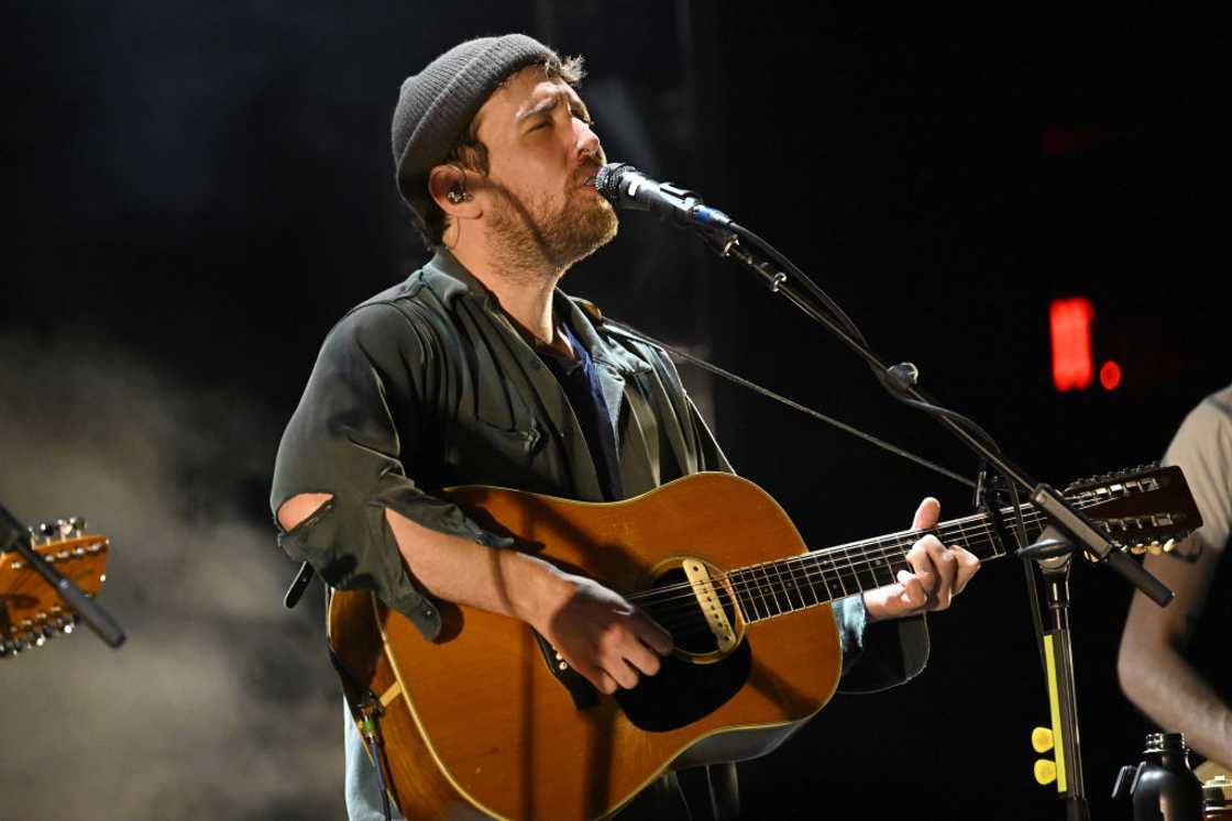 Robin Pecknold of the band Fleet Foxes preforming on stage Robin Pecknold of the band Fleet Foxes preforming on stage