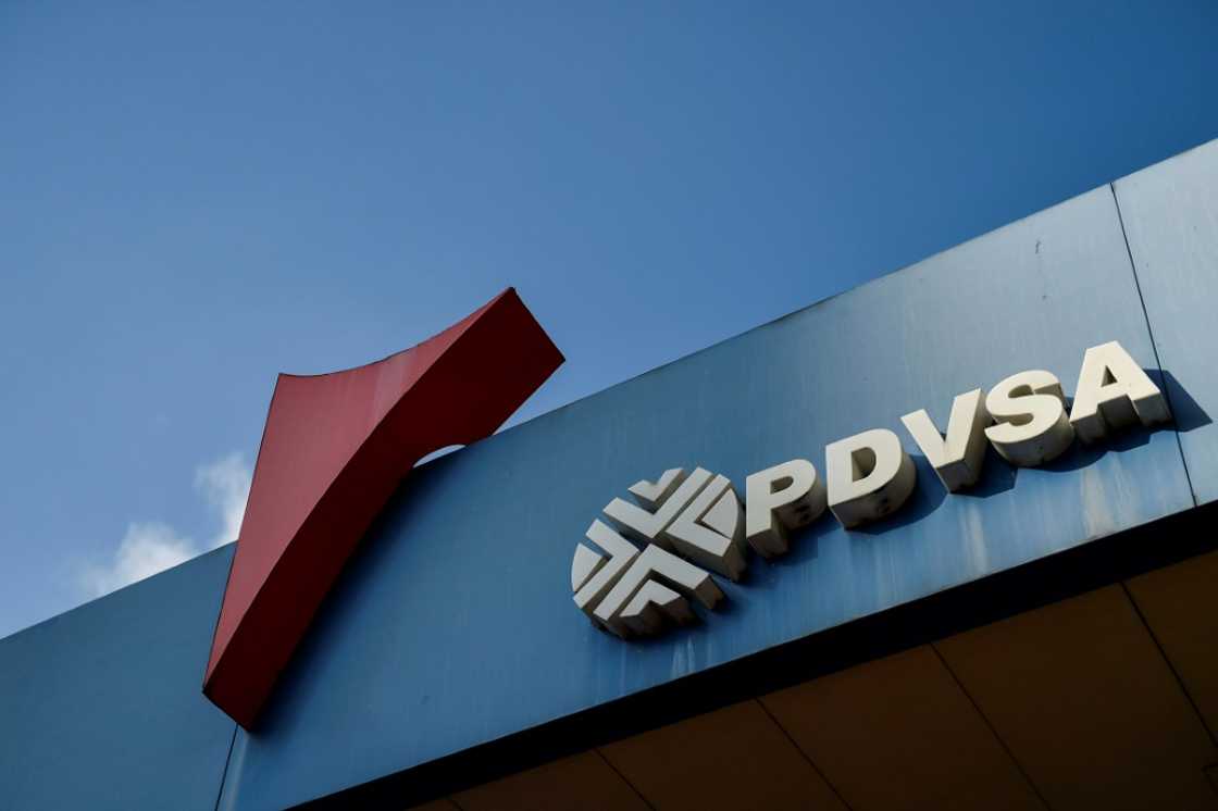 Two former top officials of Swiss-based financial asset management firm Aquila Swissinvest have been charged in the US with helping launder part of $1.2 billion taken from Venezuelan state oil firm PDVSA in a long-running corruption probe Two former top officials of Swiss-based financial asset management firm Aquila Swissinvest have been charged in the US with helping launder part of $1.2 billion taken from Venezuelan state oil firm PDVSA in a long-running corruption probe