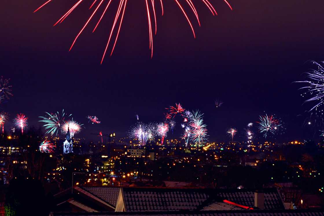 A stunning display of fireworks over a city A stunning display of fireworks over a city