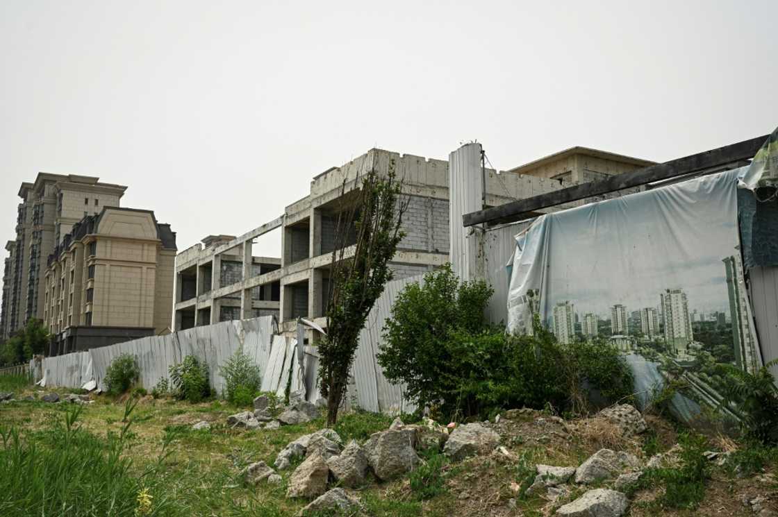 With companies unable to finish construction, many developments have been left partially finished With companies unable to finish construction, many developments have been left partially finished