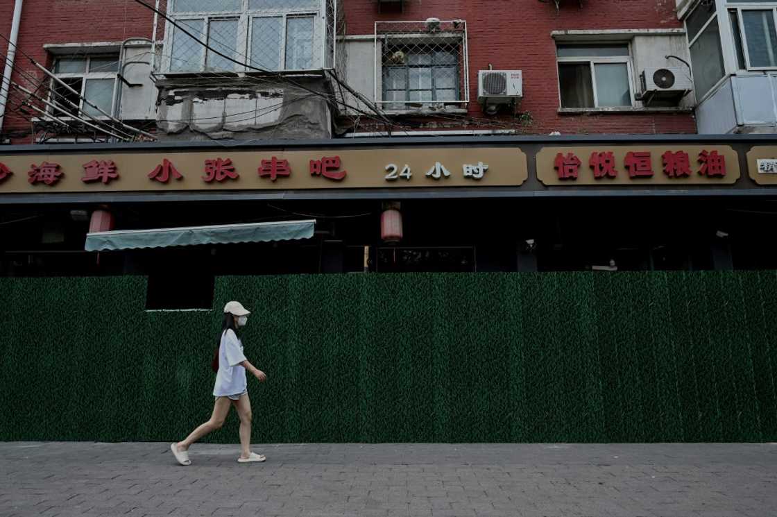 China's adherence to a zero-Covid strategy leaves firms and workers at risk of snap lockdowns China's adherence to a zero-Covid strategy leaves firms and workers at risk of snap lockdowns