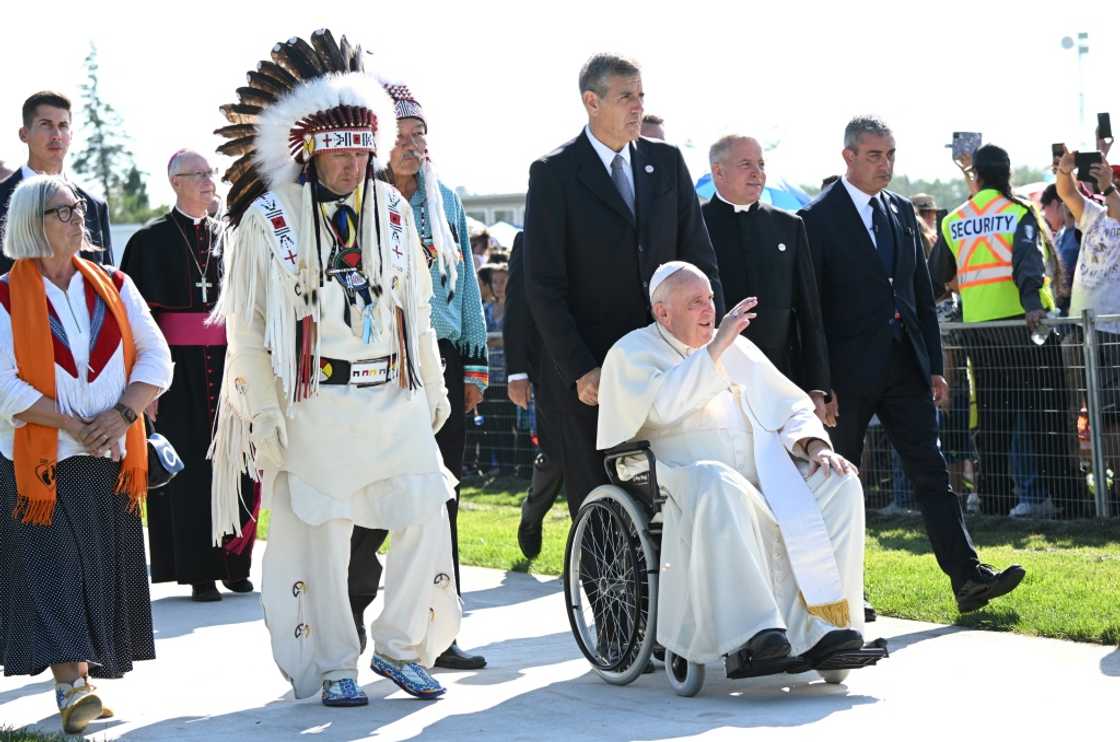 Chief Tony Alexis, of the Alexis Nakota Sioux Nation, walks alongside Pope Francis as he arrives to participate in the Lac Ste. Anne Pilgrimage at Lac Ste. Anne, northwest of Edmonton, Alberta, Canada, July 26, 2022 Chief Tony Alexis, of the Alexis Nakota Sioux Nation, walks alongside Pope Francis as he arrives to participate in the Lac Ste. Anne Pilgrimage at Lac Ste. Anne, northwest of Edmonton, Alberta, Canada, July 26, 2022
