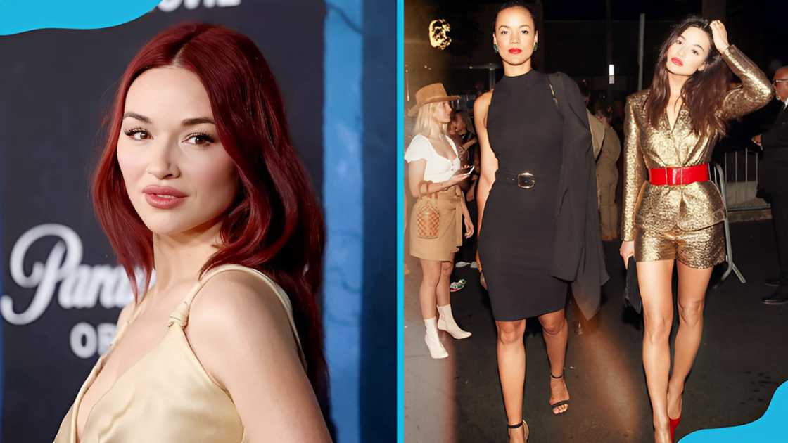 Crystal Reed and Maria Sten holding hands Crystal Reed and Maria Sten holding hands