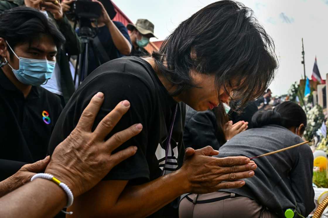 Officials solemnly carried children's treasured possessions out of the nursery to return to families -- favourite blankets and much-loved toys, each carefully placed in name-tagged bags Officials solemnly carried children's treasured possessions out of the nursery to return to families -- favourite blankets and much-loved toys, each carefully placed in name-tagged bags