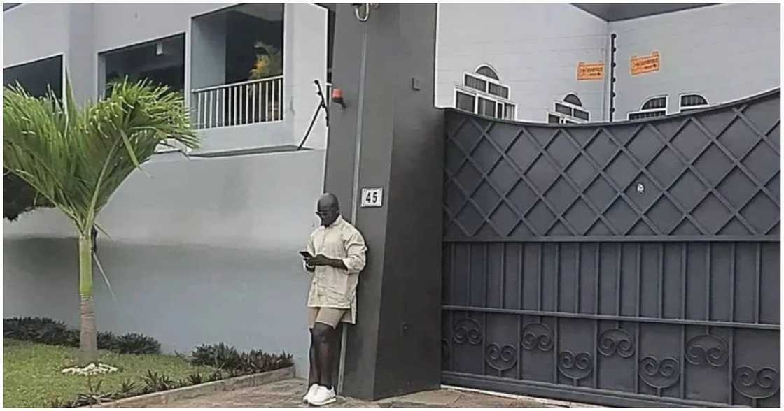 Stephen Appiah poses in front of his mansion Stephen Appiah poses in front of his mansion