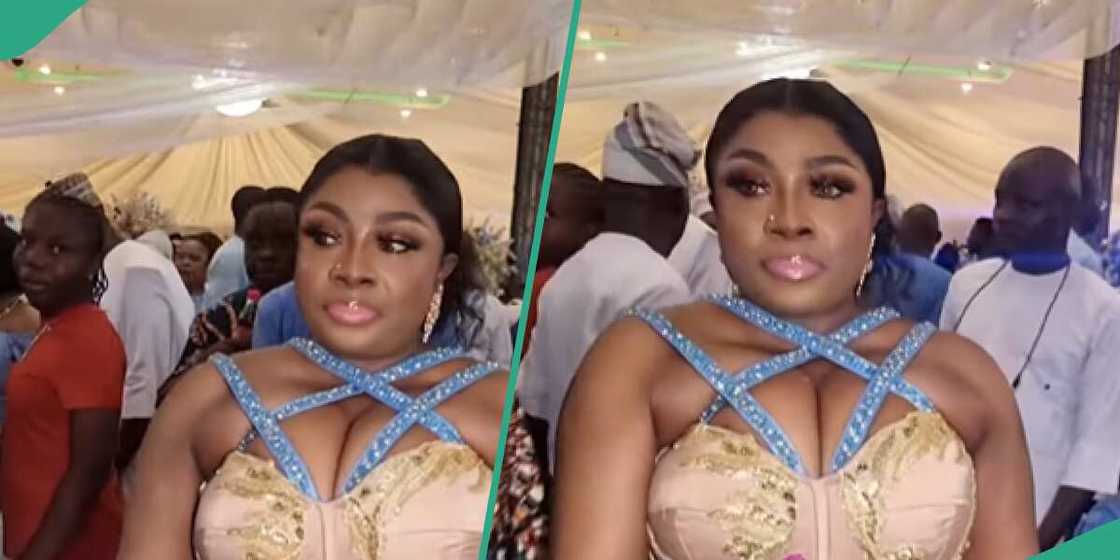 Lady causes stir with tight corset dress Lady causes stir with tight corset dress