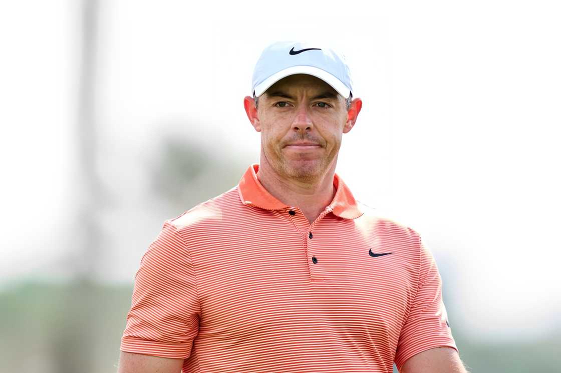 Rory McIlroy walks across the 1st hole during the final round of the Hero Dubai Desert Classic Rory McIlroy walks across the 1st hole during the final round of the Hero Dubai Desert Classic