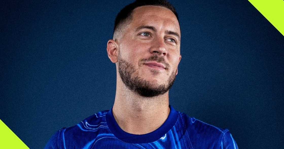 Eden Hazard models Chelsea's new home kit. Eden Hazard models Chelsea's new home kit.