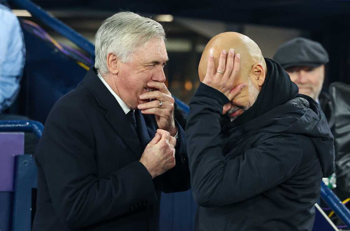 Manchester City manager Pep Guardiola greets Real Madrid manager Carlo Ancelotti during the City vs Real Madrid UEFA Champions League 2024/25 League Knockout Play-off first leg at Etihad Stadium on February 11, 2025 Manchester City manager Pep Guardiola greets Real Madrid manager Carlo Ancelotti during the City vs Real Madrid UEFA Champions League 2024/25 League Knockout Play-off first leg at Etihad Stadium on February 11, 2025