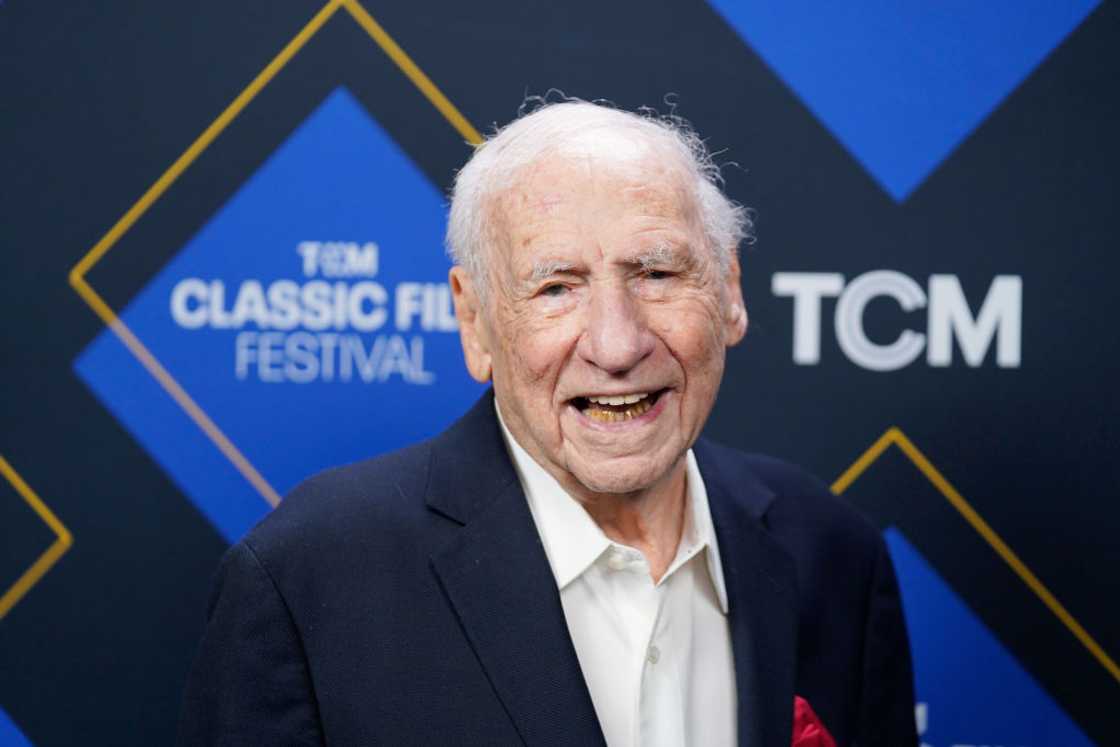 Mel Brooks in a white shirt and navy blue coat Mel Brooks in a white shirt and navy blue coat