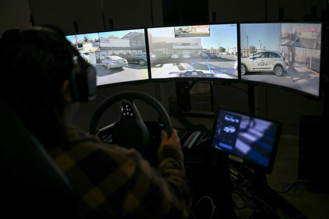 A remote driver steers a Vay vehicle during a live demonstration prior to the Consumer Electronics Show (CES) kickoff in Las Vegas, Nevada