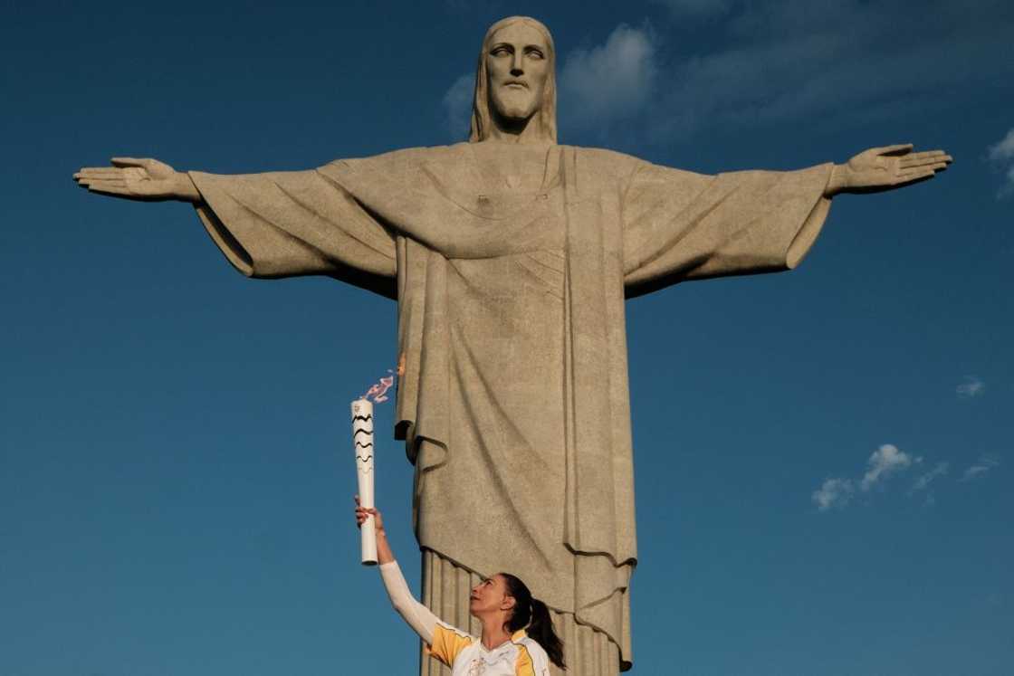 The statue of Christo the Redeemer atop Corcovado Hill in Rio de Janeiro. The statue of Christo the Redeemer atop Corcovado Hill in Rio de Janeiro.