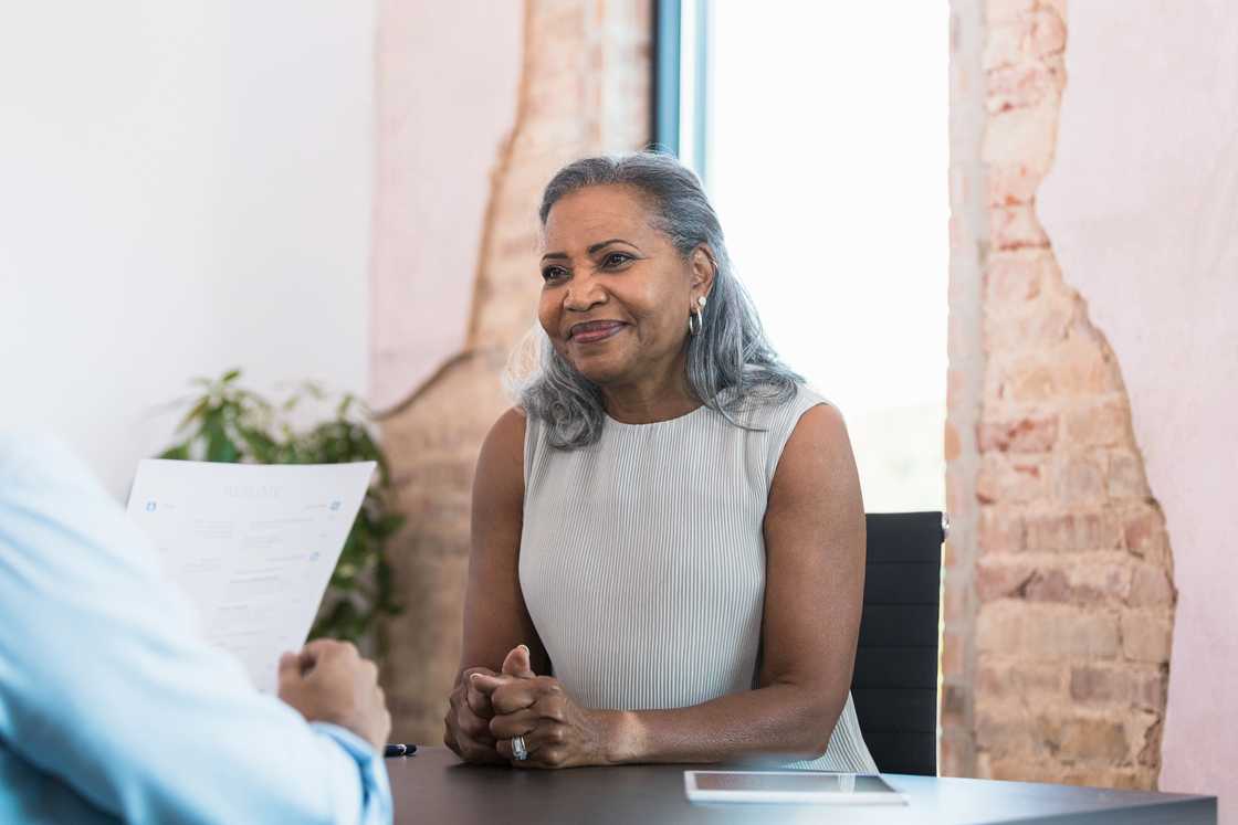a nervous woman in an interview a nervous woman in an interview