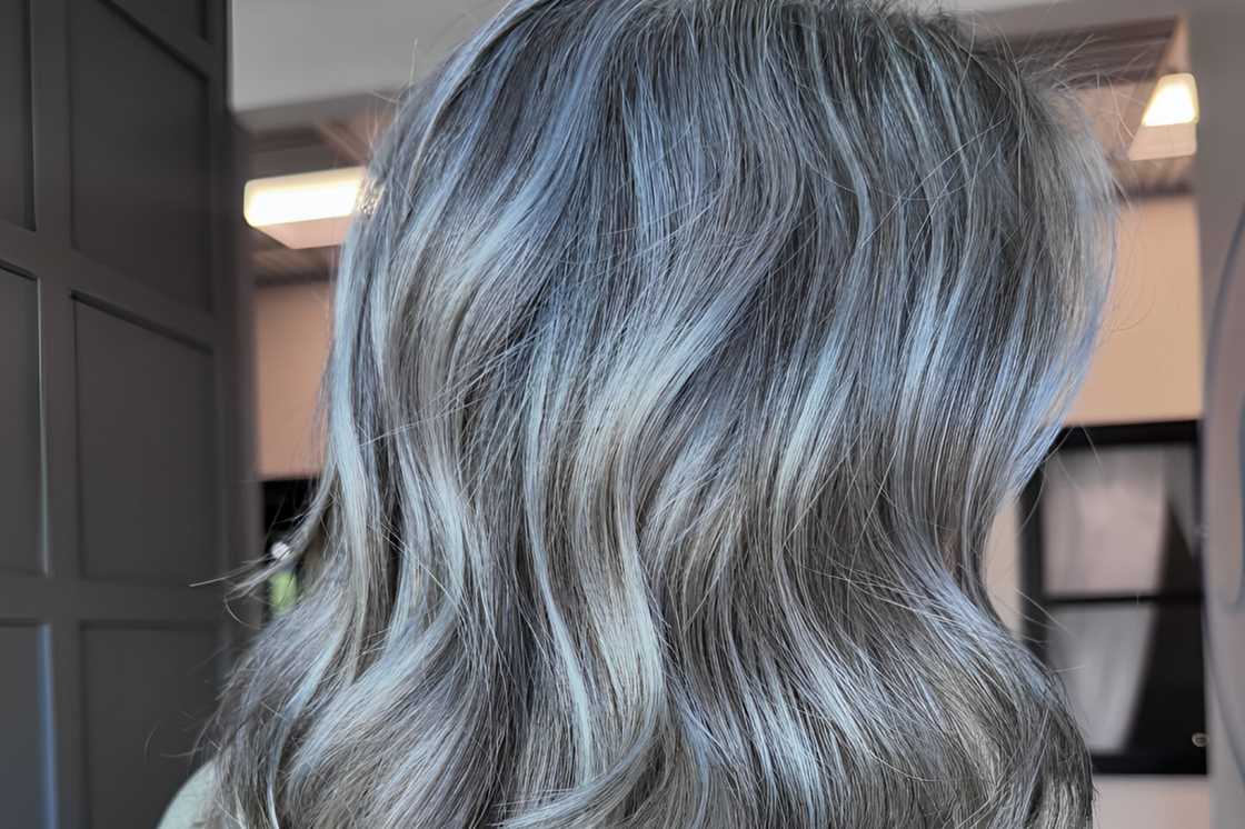 A side and back view of mid-length textured waves A side and back view of mid-length textured waves