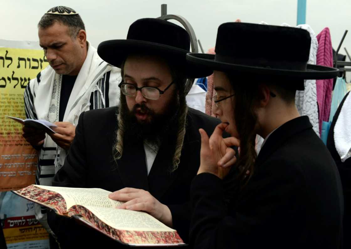 A file picture from September 13, 2015 shows ultra-Orthodox Jews pray in the Ukrainian city of Uman A file picture from September 13, 2015 shows ultra-Orthodox Jews pray in the Ukrainian city of Uman