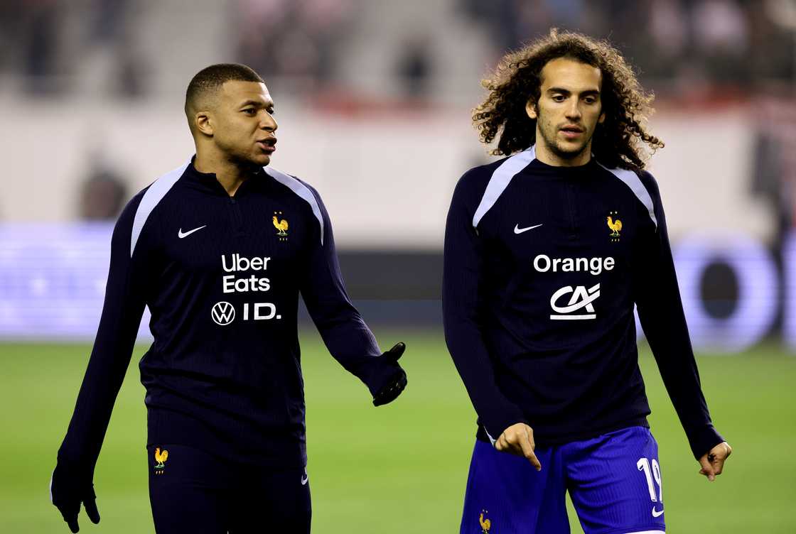 Kylian Mbappe and Matteo Guendouzi of France talk during the warm up prior to the UEFA Nations League quarterfinal leg one match between Croatia and France at Stadion Poljud on March 20, 2025 in Split, Croatia Kylian Mbappe and Matteo Guendouzi of France talk during the warm up prior to the UEFA Nations League quarterfinal leg one match between Croatia and France at Stadion Poljud on March 20, 2025 in Split, Croatia