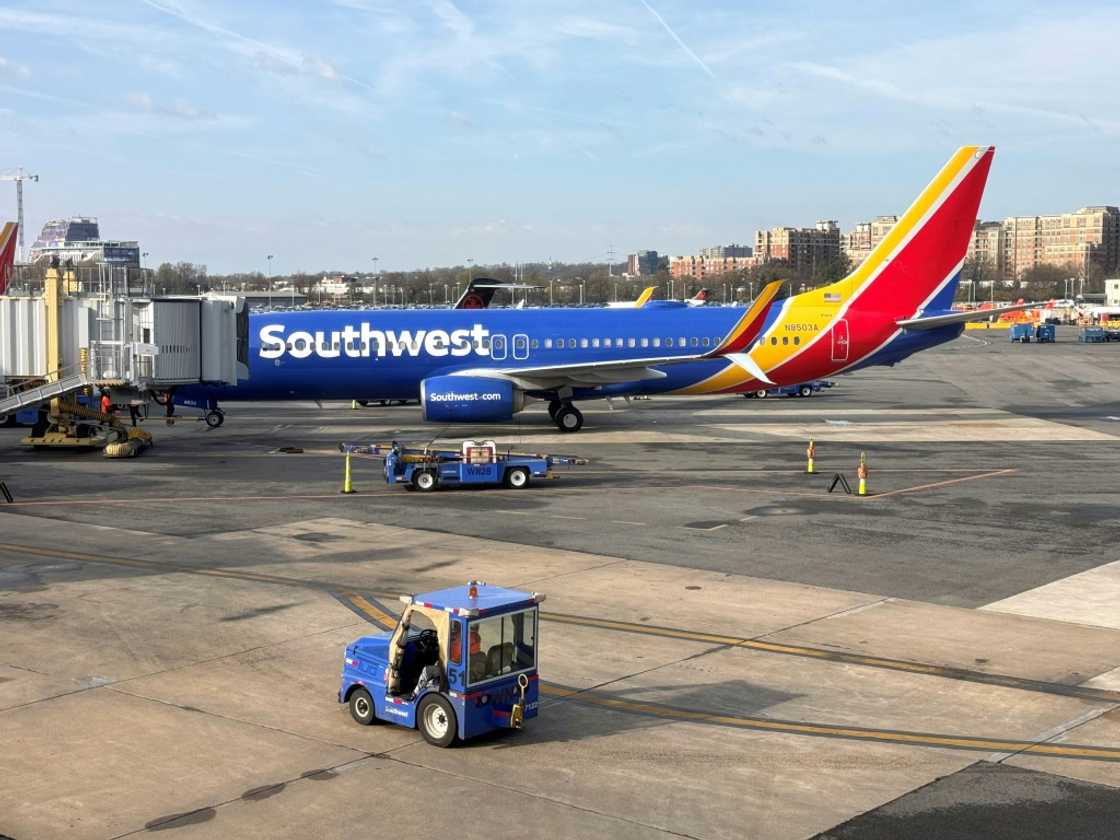 A Southwest Airlines Boeing 737 sits at a gate at Washington's Reagan National Airport (DCA) in Arlington, Virginia, on March 31, 2024 A Southwest Airlines Boeing 737 sits at a gate at Washington's Reagan National Airport (DCA) in Arlington, Virginia, on March 31, 2024