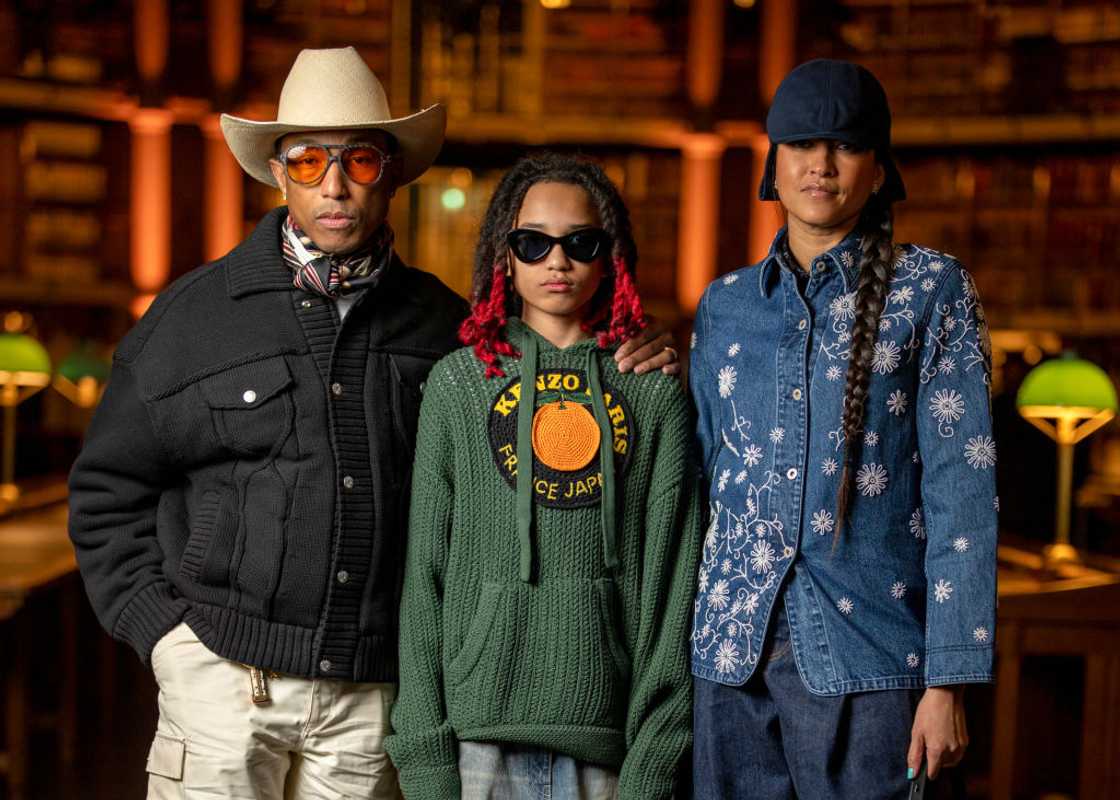Pharell Williams, his wife Helen and son Rocket during a Kenzo Men's Fall 2024 Pharell Williams, his wife Helen and son Rocket during a Kenzo Men's Fall 2024