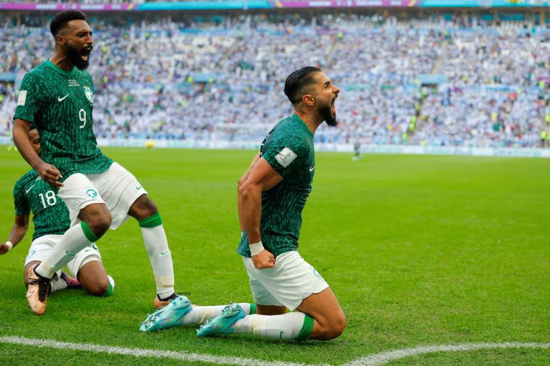 Saudi Arabia's Saleh al-Shehri celebrates after scoring his team's first goal, on the way to a 2-1 victory over Argentina that stunned the world