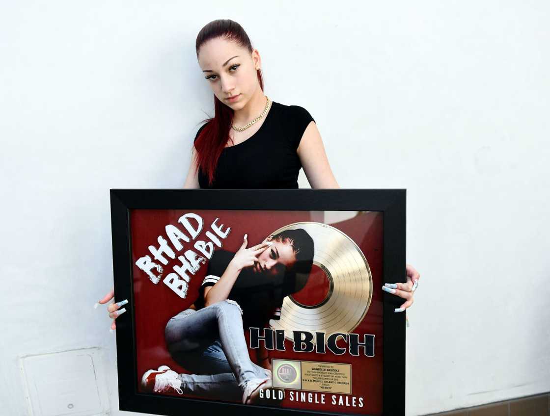 Bhad Bhabie receives the gold record for her Song "Hi Bich" in Los Angeles. Bhad Bhabie receives the gold record for her Song "Hi Bich" in Los Angeles.