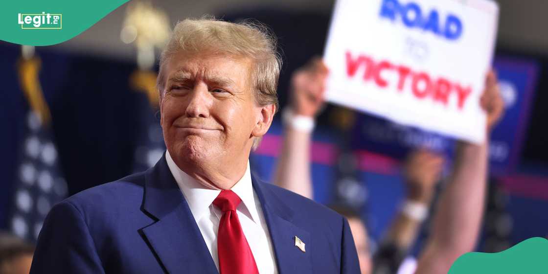 Moment Trump ducks and swarmed by security after assassination attempt Moment Trump ducks and swarmed by security after assassination attempt