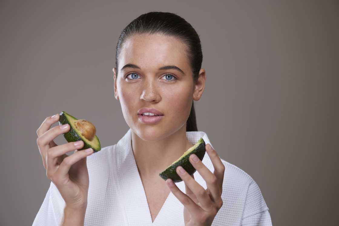 A close-up beauty shot of female models, some with food and clean living energy