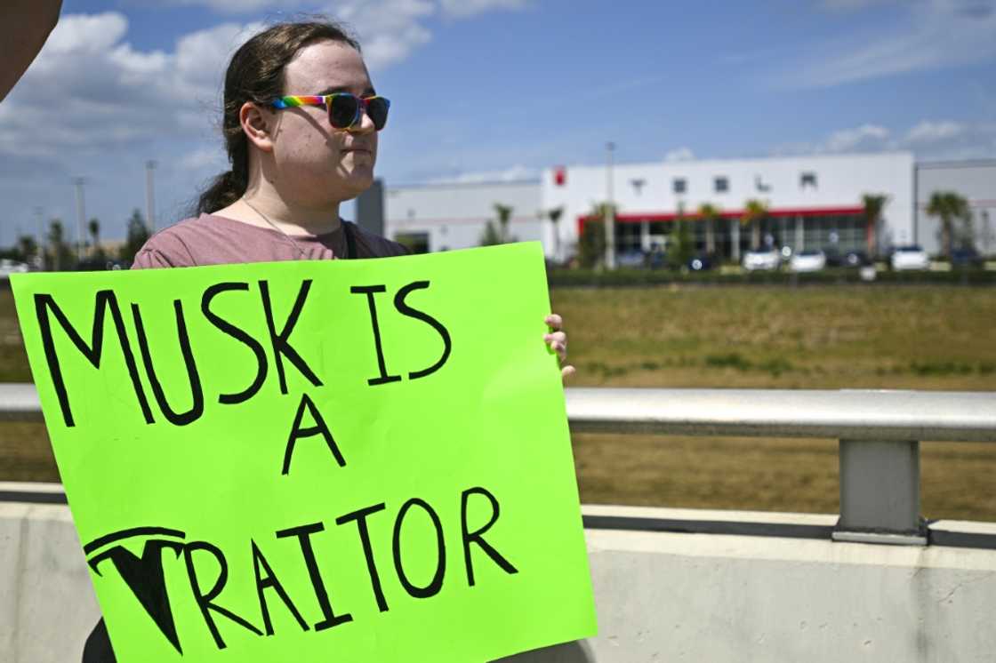 Demonstrators denounce Tesla CEO Elon Musk in Clermont, Florida, part of a day of protest against the tech billionaire on March 29, 2025 Demonstrators denounce Tesla CEO Elon Musk in Clermont, Florida, part of a day of protest against the tech billionaire on March 29, 2025