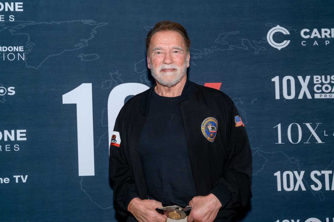 Arnold Schwarzenegger in a black jacket