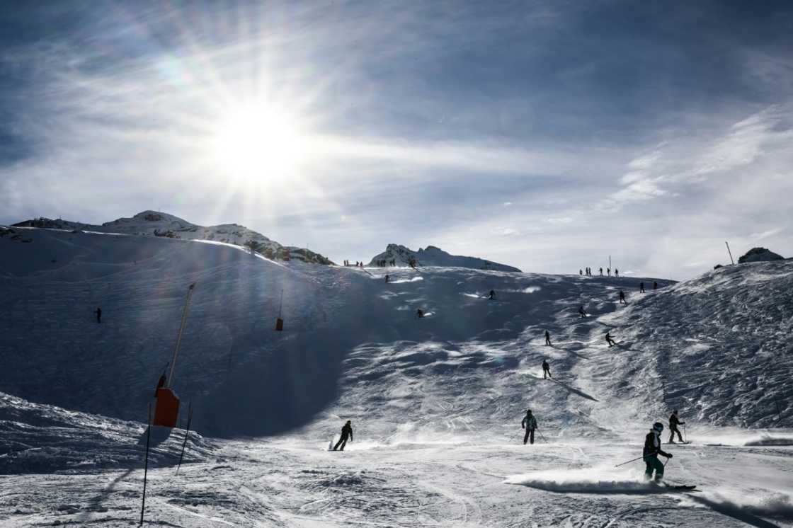 Skiers enjoy the pistes at Val Thorens -- one of the first downhill resorts to open Skiers enjoy the pistes at Val Thorens -- one of the first downhill resorts to open