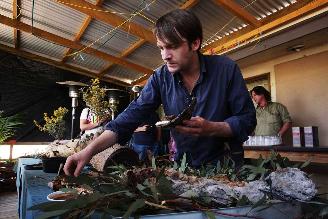 Rene Redzepi samples some kangaroo meat during a visit to the Iga Warta indigenous community Rene Redzepi samples some kangaroo meat during a visit to the Iga Warta indigenous community