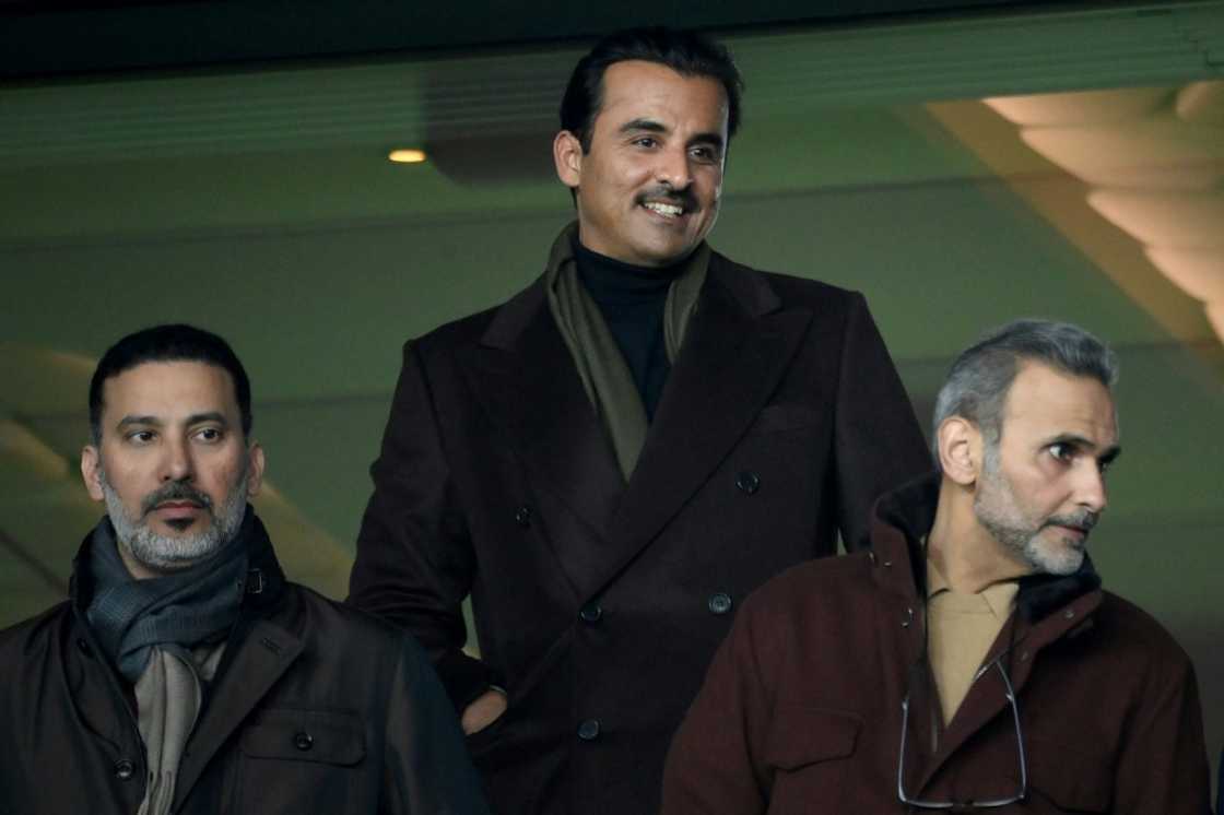 Qatar's Emir Sheikh Tamim bin Hamad al-Thani (centre) is rumoured to be a bidder for Manchester United Qatar's Emir Sheikh Tamim bin Hamad al-Thani (centre) is rumoured to be a bidder for Manchester United