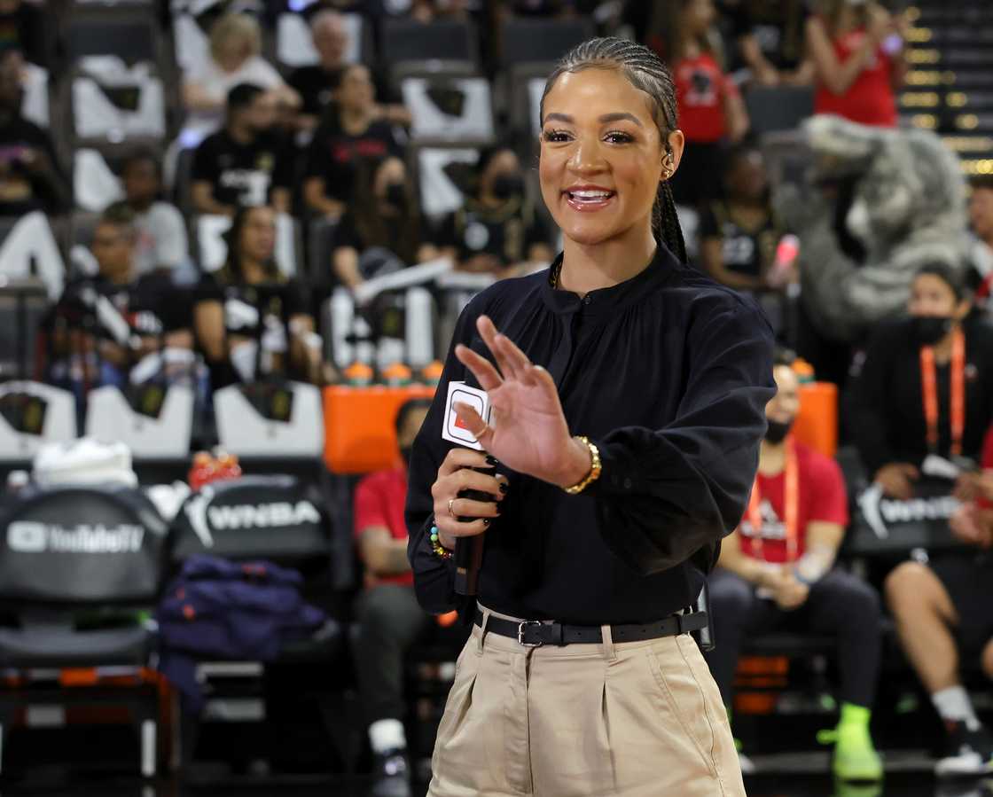 Andraya greets an attendee as she broadcasts before a game between the Connecticut Sun and the Las Vegas Aces in Nevada. Andraya greets an attendee as she broadcasts before a game between the Connecticut Sun and the Las Vegas Aces in Nevada.