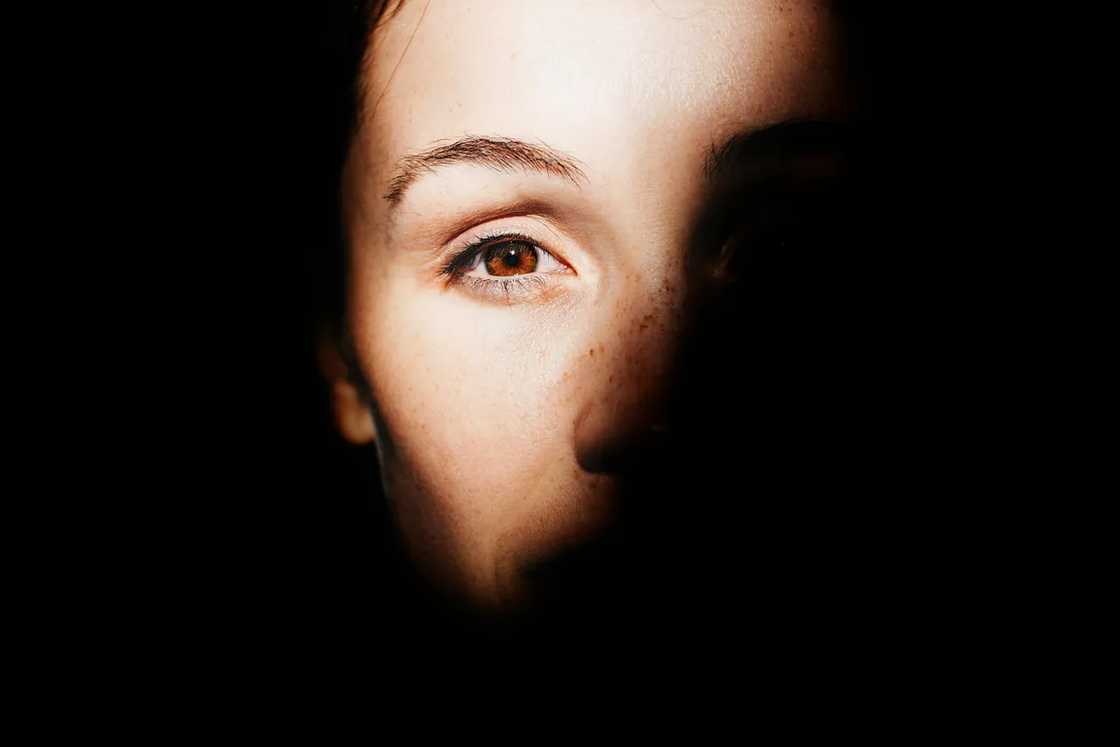 Woman in shadows