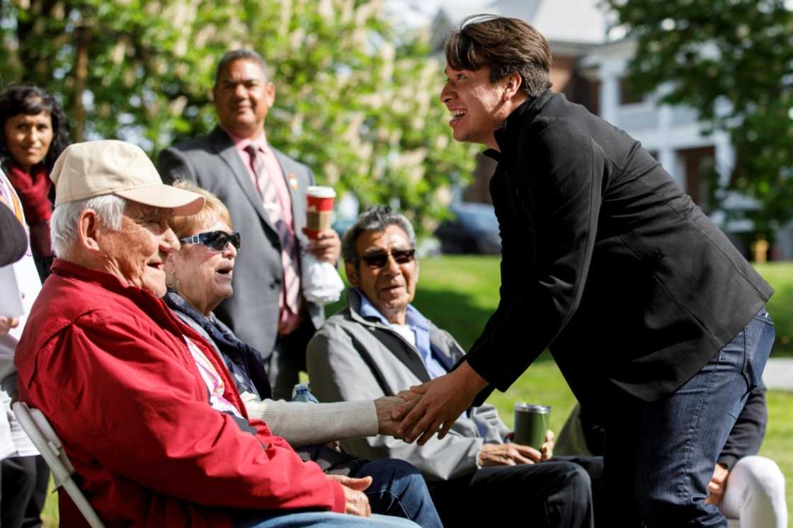 Chief Mark Hill, of the Six Nations of the Grand River, greets residential school survivors during a commemorative tree planting ceremony in Brantford, Ontario, Canada, on May 24, 2022 Chief Mark Hill, of the Six Nations of the Grand River, greets residential school survivors during a commemorative tree planting ceremony in Brantford, Ontario, Canada, on May 24, 2022
