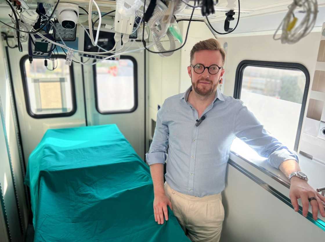 Emil Kendziorra, CEO of Tomorrow Biostastis, in one of the company's ambulances outside their headquarters in Berlin