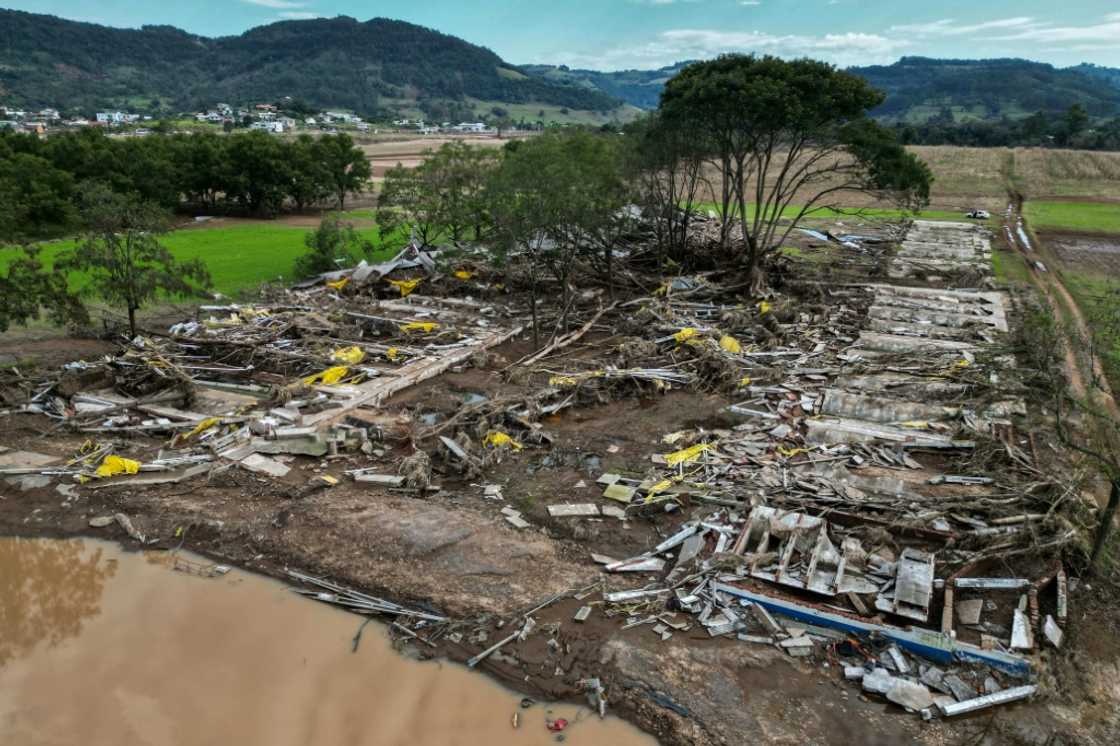 Aerial view of a pig farm destroyed in the flooding, which washed away some 5,000 of the animals here