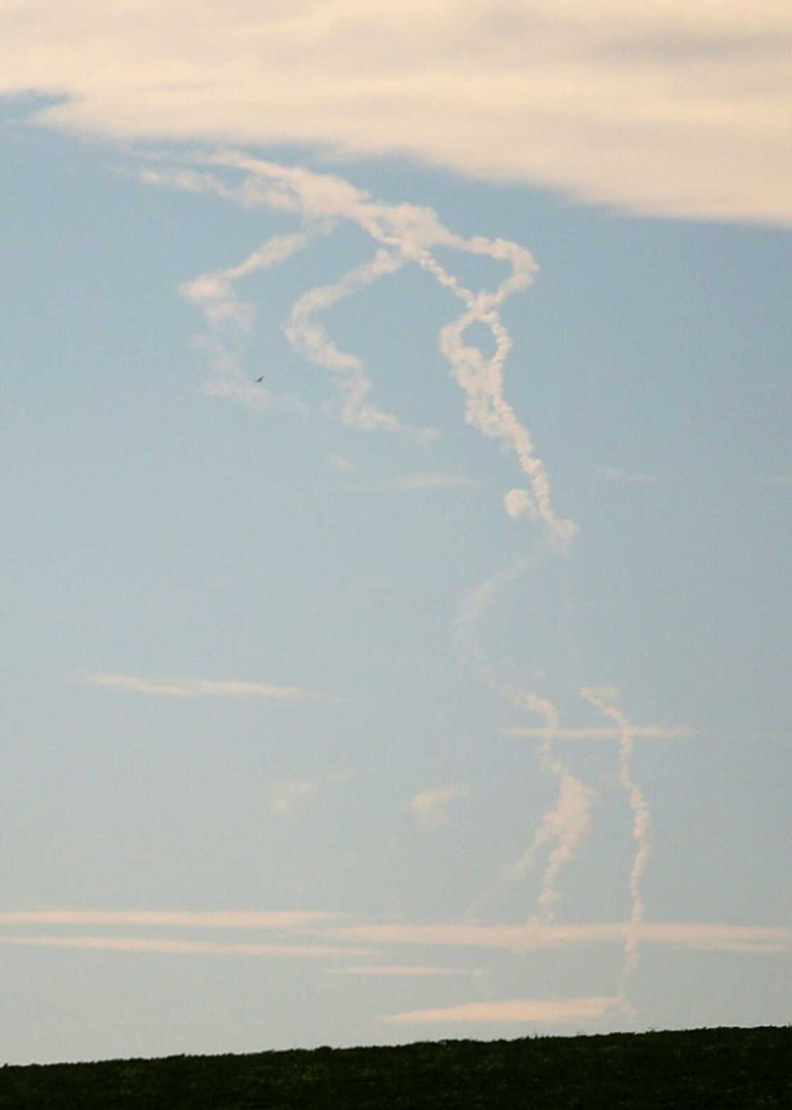 Rockets trails are seen in the sky in Ukraine's eastern Donbas region