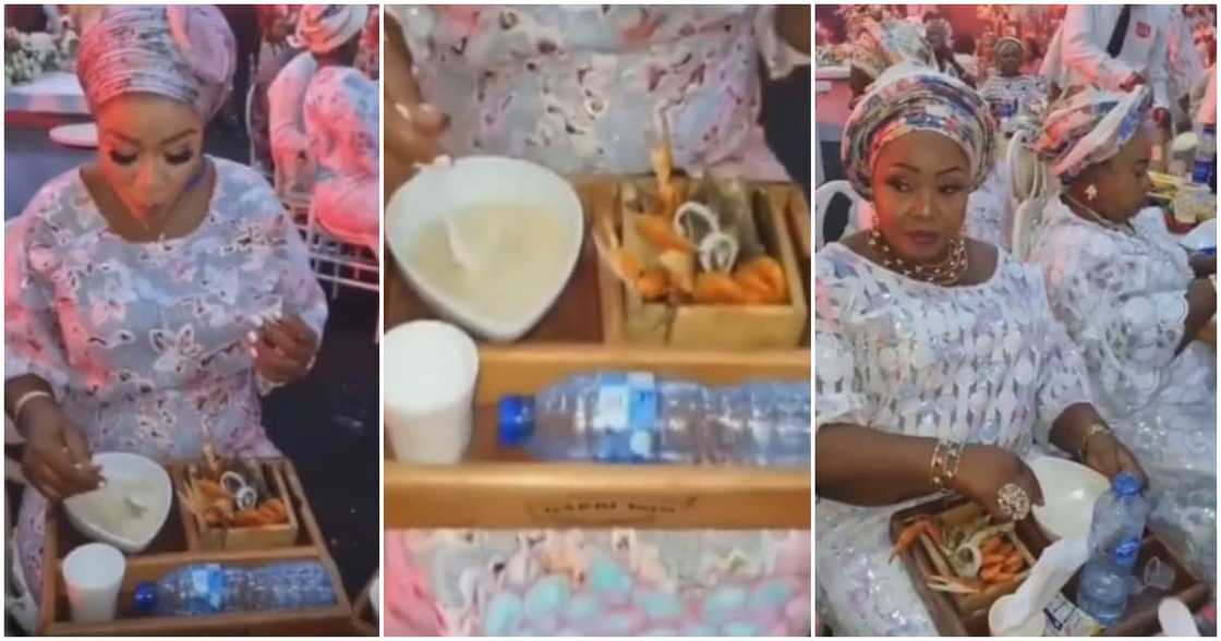 Nigerians react to viral video of guests eating chilled garri and seafood as refreshments at an event Nigerians react to viral video of guests eating chilled garri and seafood as refreshments at an event